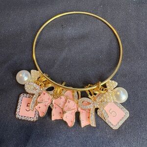 Elegant Gold and Pink Charm Bracelet